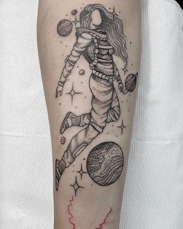 Dotwork astronaut girl with planets and stars forearm tattoo by Diya Tattoo, Kathmandu